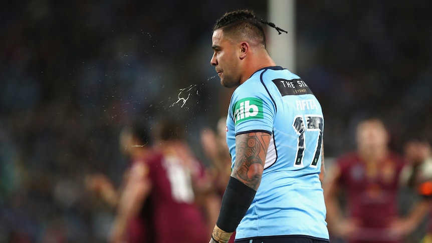Andrew Fifita spits as he is sent to the sin bin