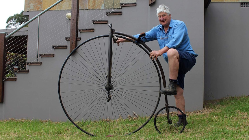 Lawrence Stokes with the 'Penny Farthing' bike that was built in 1888 for his grandfather Harry Stokes.