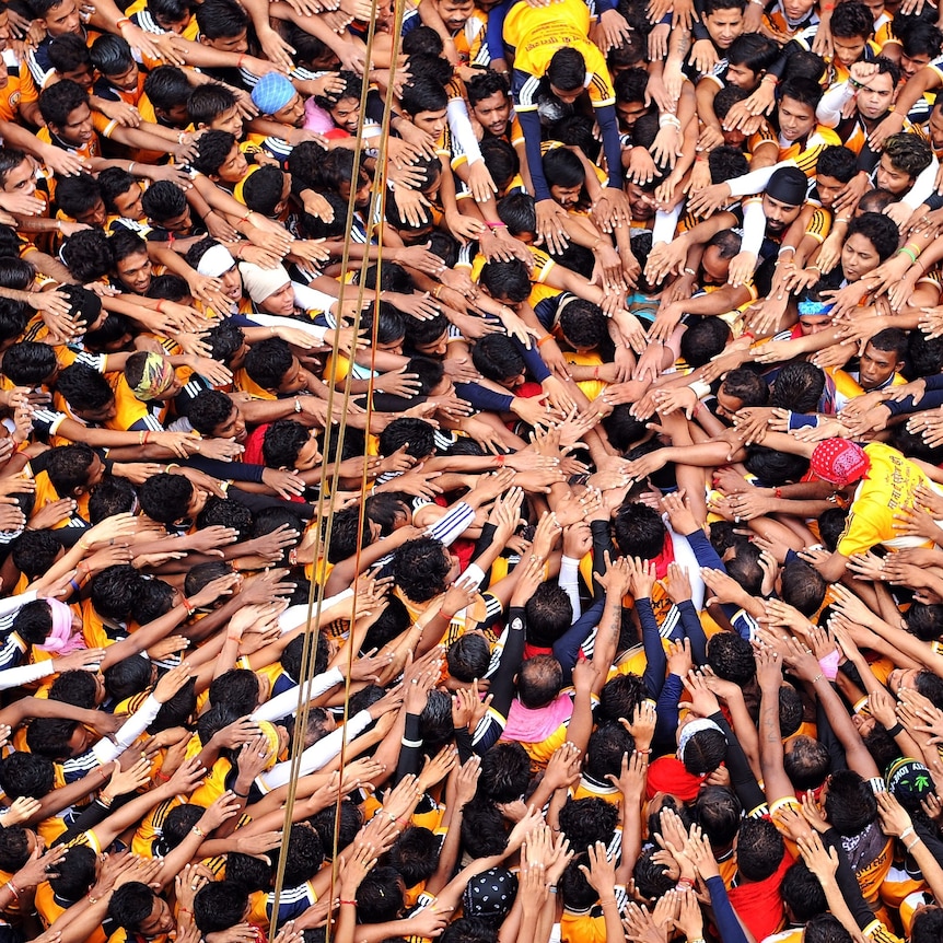 Crowd of Indian Hindu devotees all overlapping one another