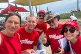 A group of people wearing red shirts, including Labor MP Jordan Crugnale.