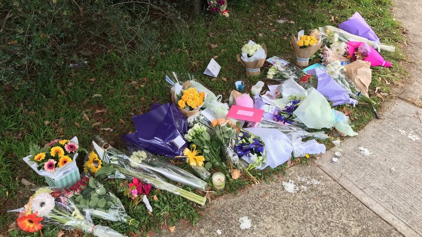 Flowers at the scene on Saturday