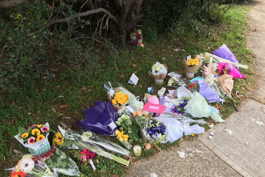 Flowers at the scene on Saturday