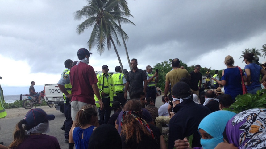Nauru police arrest refugees outside Yaren police station