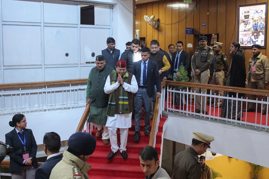 Uttarakhand Chief Minister Pushkar Singh Dhami gestures as he attends the state assembly to pass the new civil code. 