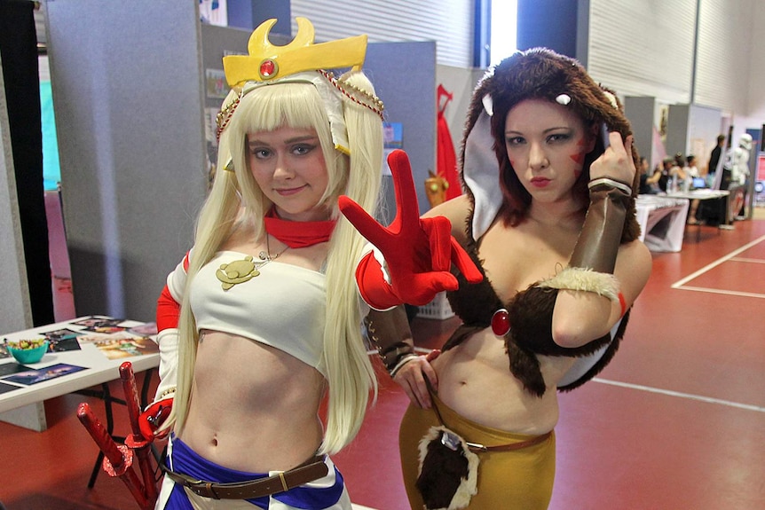 Two women in cosplay outfits