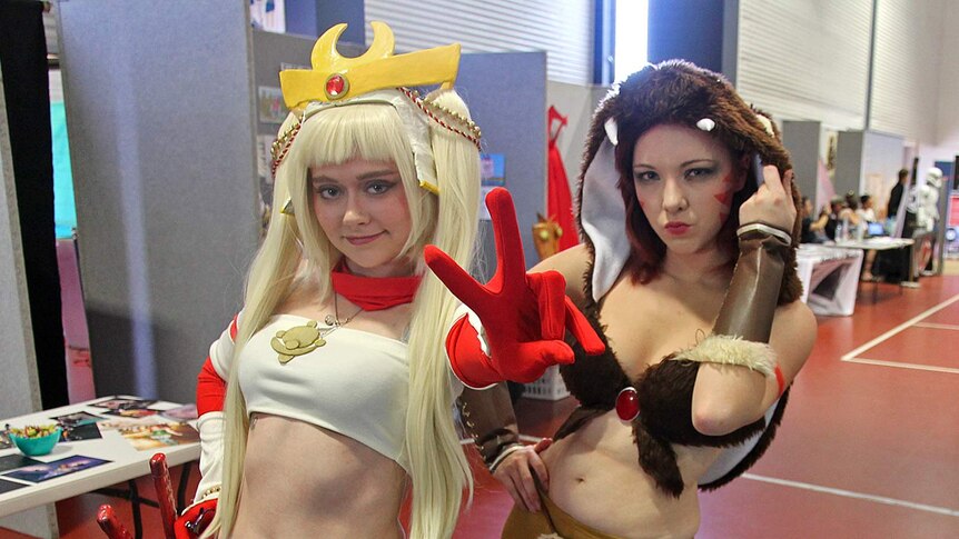 Two women in cosplay outfits