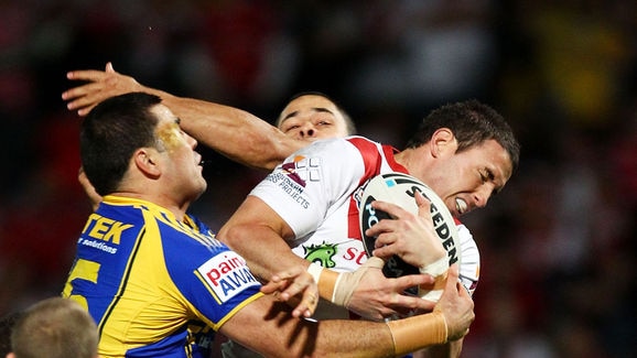 Dragons on top...Darius Boyd soars for a high ball against an Eels challenge.