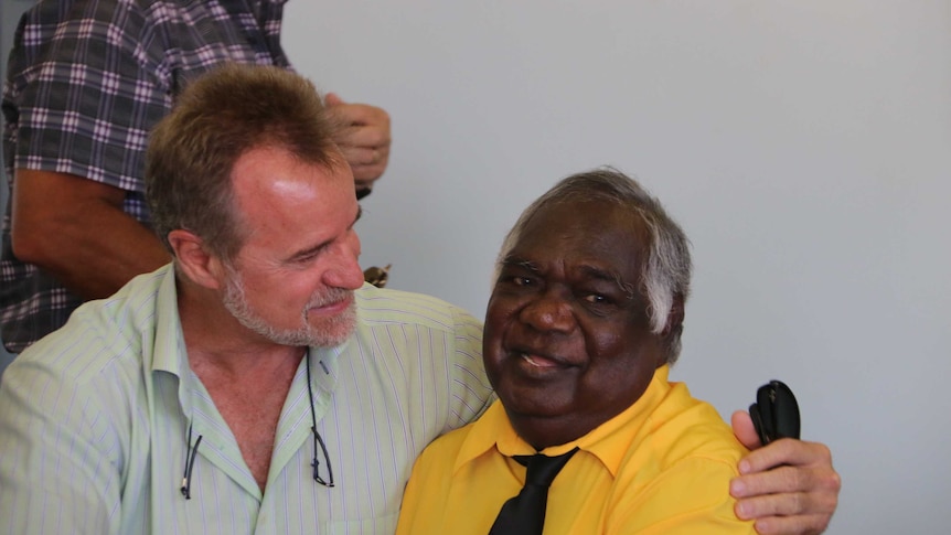 Nigel Scullion and Galarrwuy Yunupingu embrace at the ceremony.