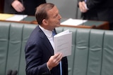 Prime Minister Tony Abbott introduces the bill to repeal the carbon tax.