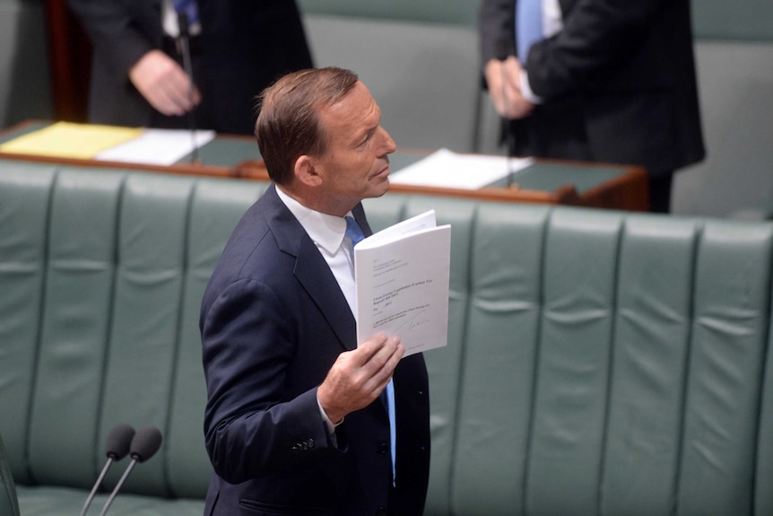 Prime Minister Tony Abbott introduces the bill to repeal the carbon tax.