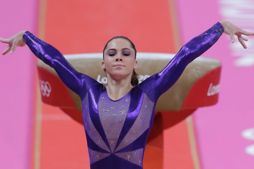 McKayla Maroney poses during gymnastics routine
