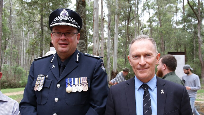 Victoria Police Chief Commissioner Graham Ashton stands with Leo Kennedy, descendant of Sergeant Michael Kennedy