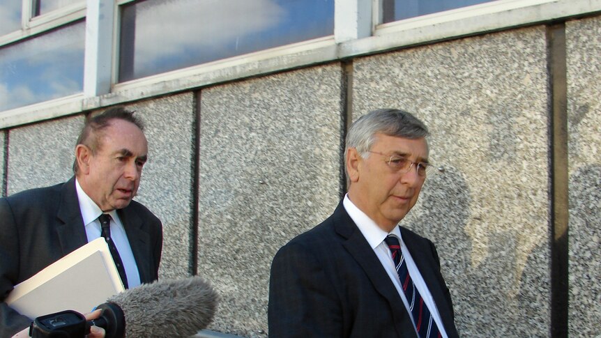 Former Gunns boss John Gay leaves Launceston magistrates Court with his lawyer, Bill Griffiths