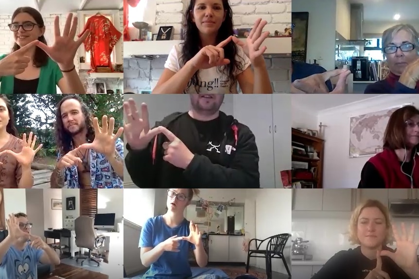 Screenshot of AUSLAN Zoom class with participants pointing to their thumbs