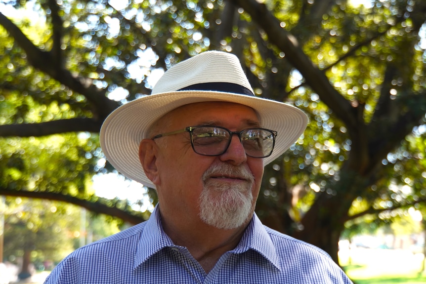 image of a man with a goatee and a hat