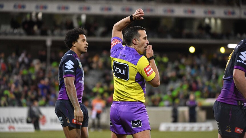 Matt Cecchin officiates during the NRL clash between Canberra and Melbourne