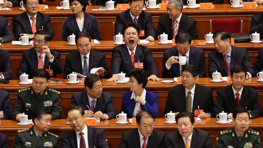 Delegates sit at the opening ceremony of 18th National Congress of the Communist Party of China