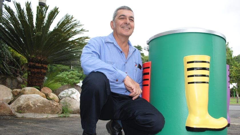 La Fauci has created a concrete and fibreglass cover adorned with coloured gumboots to brighten up the Council bins.