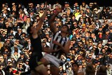 Spotlight on ... Over 85,000 fans turned out to watch the bitter rivals Collingwood and Carlton duke it out at the MCG.
