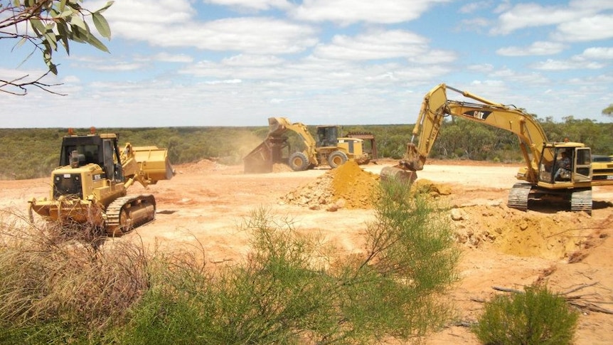 Bulldozers in a quarry