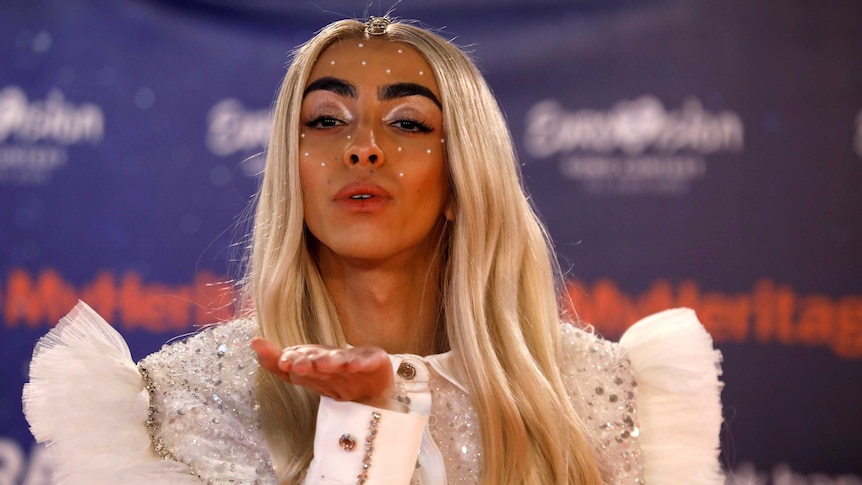 Bilal Hassani poses for photographers