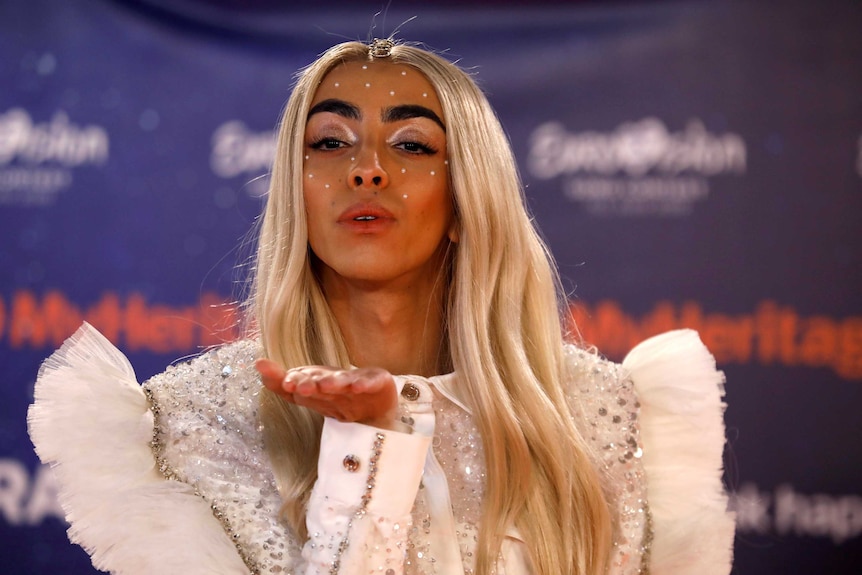 Bilal Hassani poses for photographers