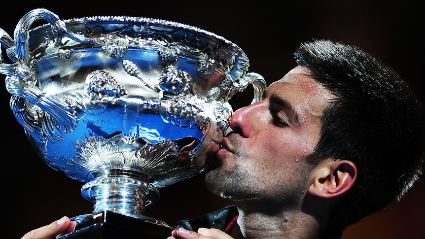 Djokovic kisses the trophy