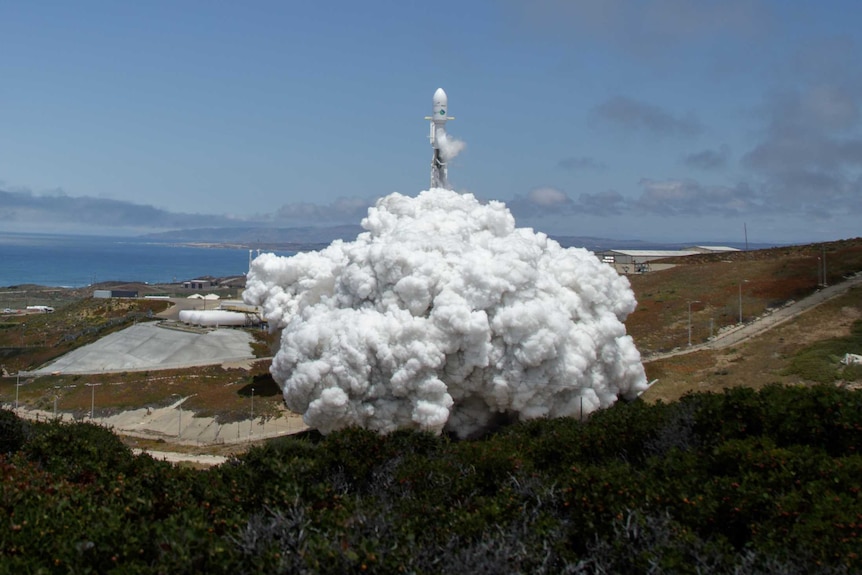 A SpaceX Falcon 9 rocket launches at Vandenberg Air Force Base in California.