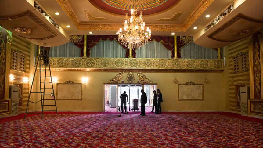 Cleaning one of the spectacular rooms in the hotel.