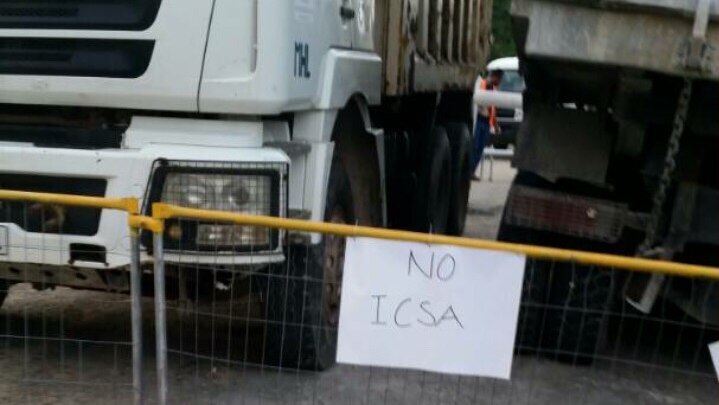 Protestors display sign saying No ICSA (PNG Immigration and Citizenship Service Authority) at their blockade.