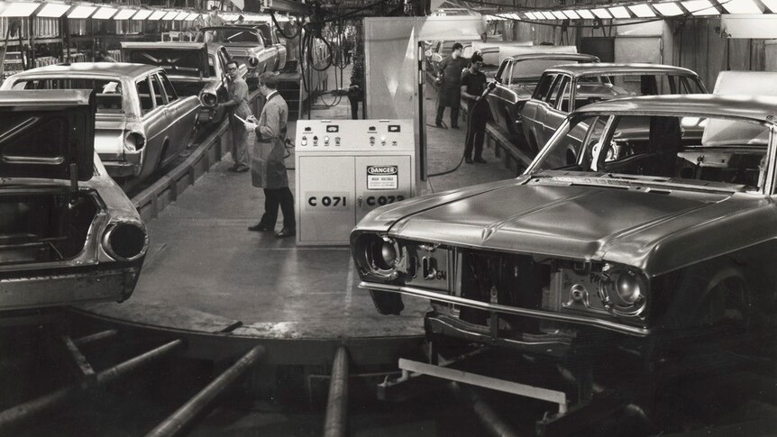 Cars on a conveyor belt at the Broadmeadows Ford plant, where the JFK limousine was repainted.