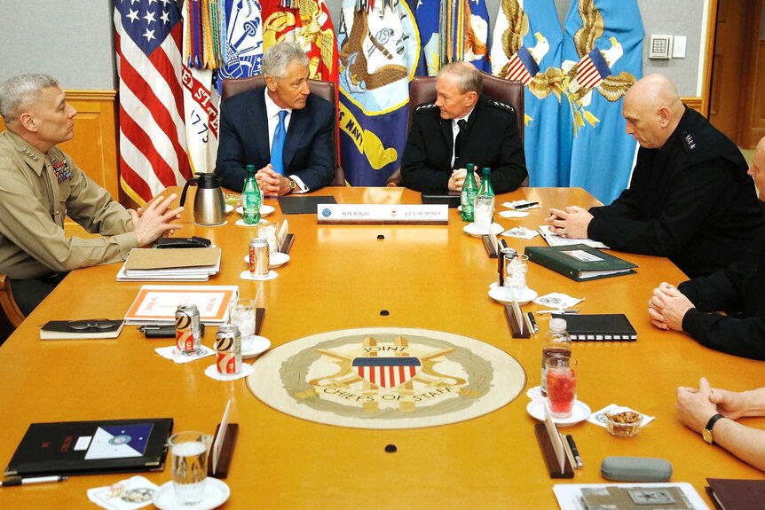 A meeting is held at Pentagon briefing room 'The Tank'