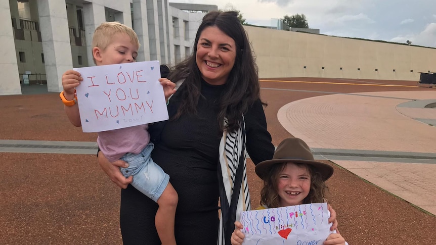 Samantha Payne and her children at parliament House celebrate new legislation on miscarriage laws