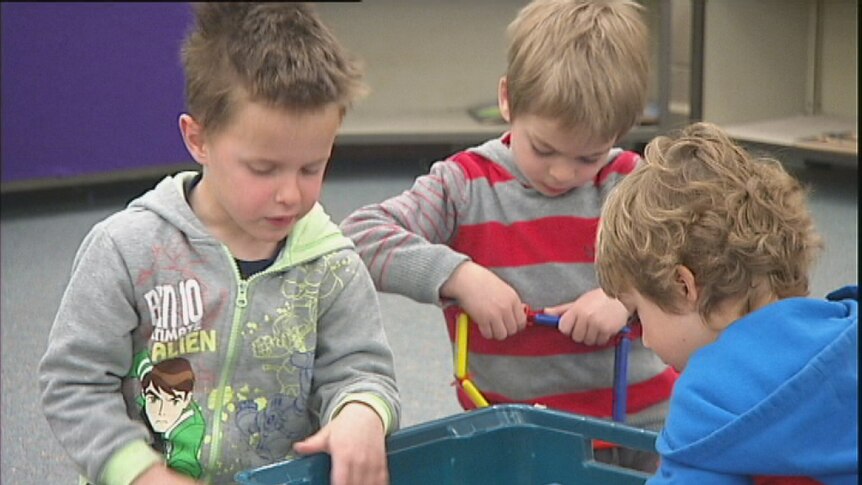 Video still: Three preschool boys playing with toys at Canberra Preschool Aug 2012