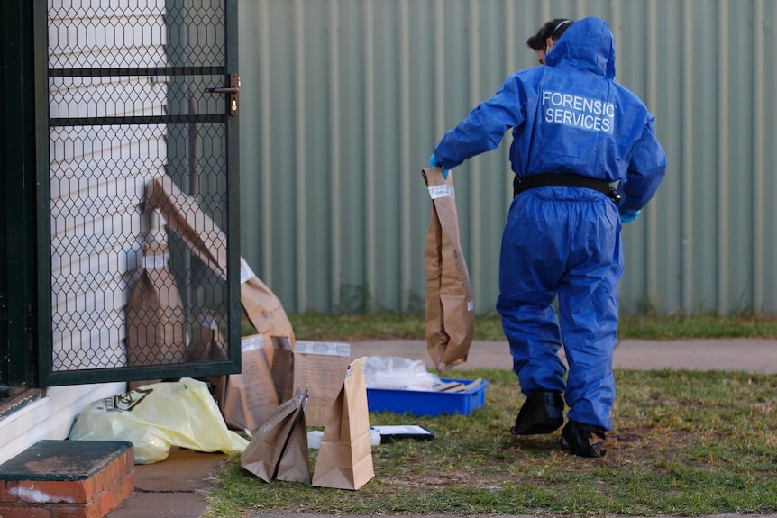 Forensics team search a property in the town of Leeton