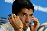 Luis Suarez at a press conference