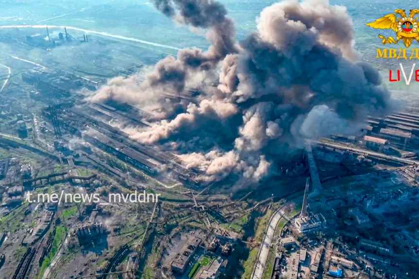 Thick black smoke rises from the Metallurgical Combine Azovstal in Mariupol.