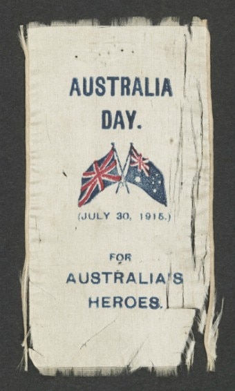 A photo of a frayed ribbon that says "Australia Day for Australia's Heroes".