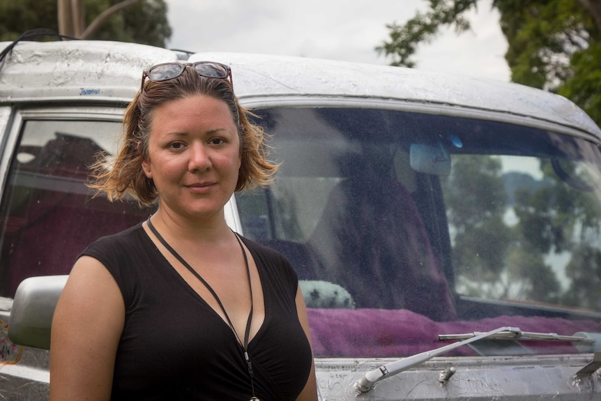 Artist Tatjana Seserko in front of the Homeless Carapace van.