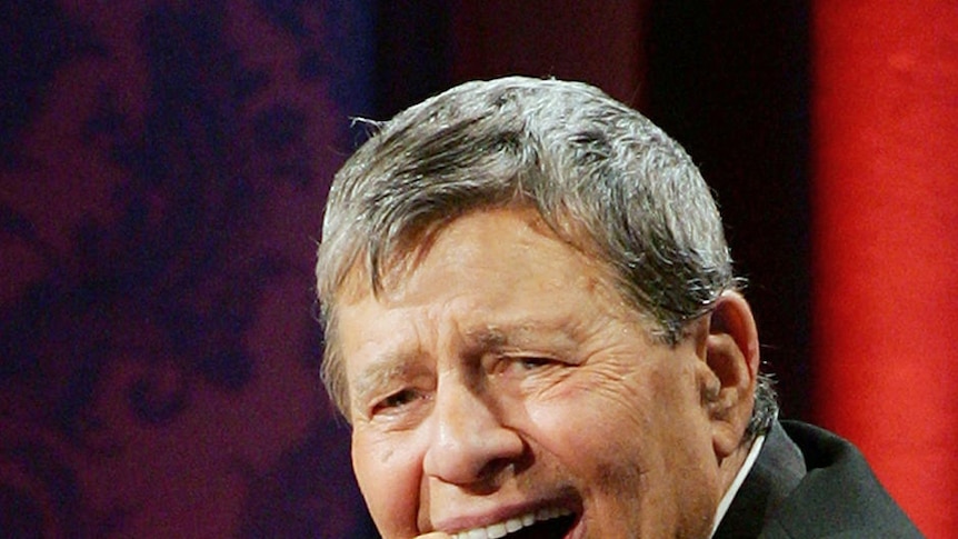 Veteran comedian Jerry Lewis laughs