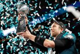 Nick Foles looks longingly at the Vince Lombardi Trophy