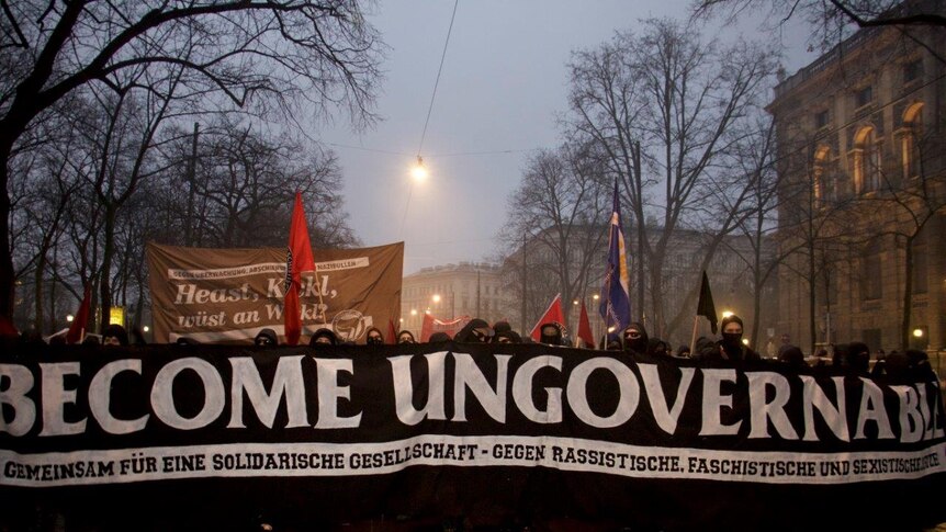Austrian anti-fascists protest the new right-wing government with a large banner that reads "become ungovernable".