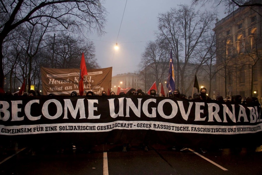 Austrian anti-fascists protest the new right-wing government with a large banner that reads "become ungovernable".