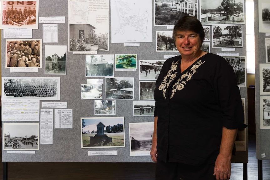 Marion Lofthouse with a collage of images from WWII