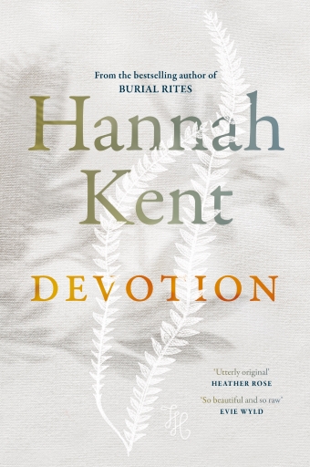 The book cover of Devotion by Hannah Kent, a grey background inlaid with white plants and shadows of other plants