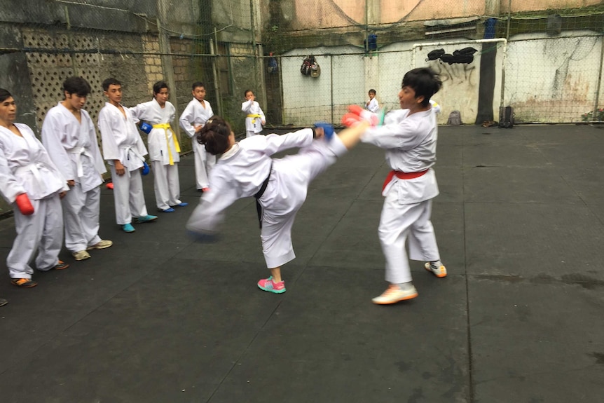 Students practice at the Cisarua Refugee Shotokan Karate Club