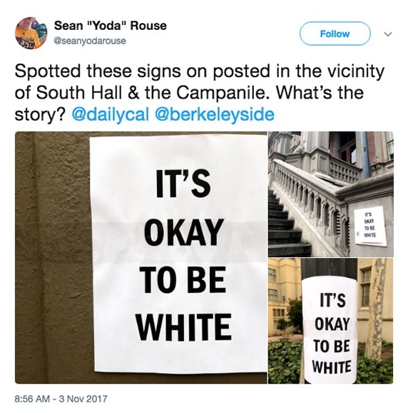 Tweet showing 'It's OK to be white' posters