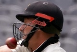 A Western Australian batsman is hit in the helmet by a rising delivery at the MCG.