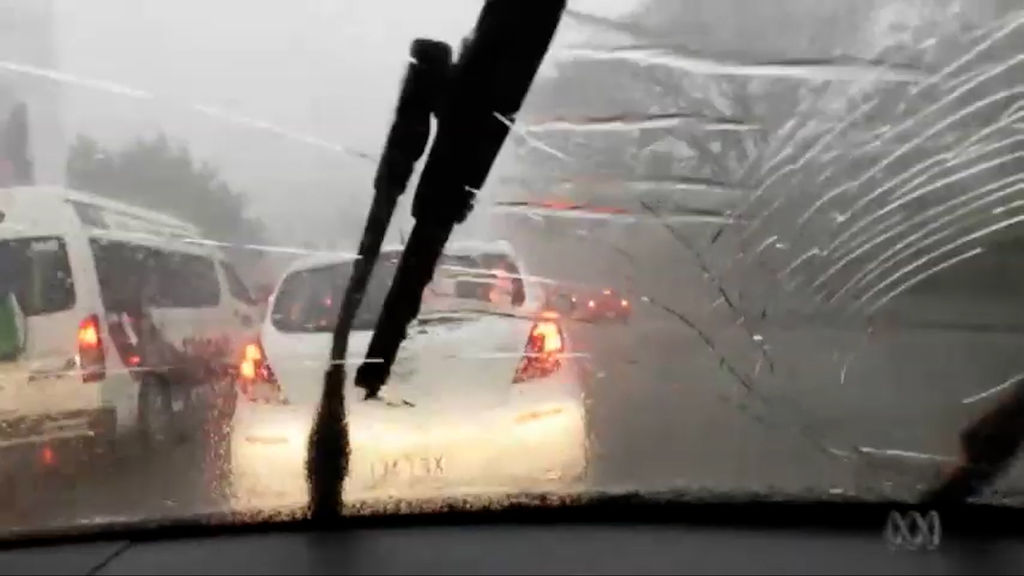 Windscreen smashes as hail pounds Brisbane in 2014 - ABC News