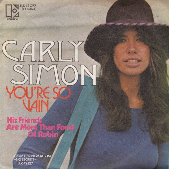 The single cover for the song You're So Vain, featuring a smiling woman wearing a hat.